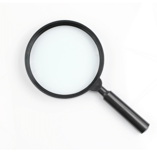 A magnifying glass to illustrate business proofreading
