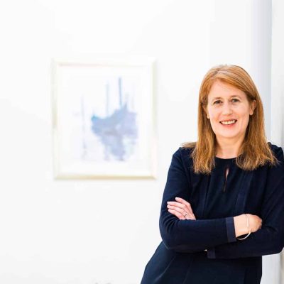 Bright-Words-Creative-Karen-arms-folded-leaning-against-a-wall-widescreen
