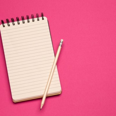 Attention-grabbing content represented by a notepad and pencil