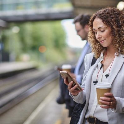 morning connection Social media marketing signified by a woman using a phone