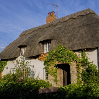 Property copywriter represented by a cottage